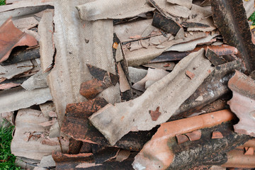 Old and dangerous asbestos roof. Asbestos fibers in the environment.