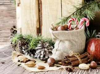 New Year or Christmas composition with walnuts, mulled wine wood background, selective focus