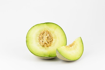 Green melon on white isolated background