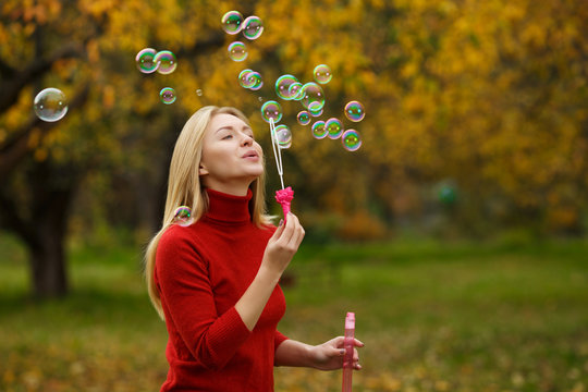girl with soap bubbles. camping