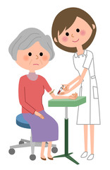 看護師と高齢者　採血