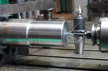 Close-up drilling machine making hole with annular cutter, core drill.