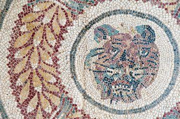 Old roman mosaics: view of figures and motifs in the floor of the old roman Villa del Casale of the 4th century A.C. in the town Piazza Armerina, Sicily