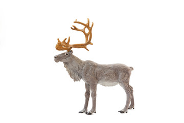 Figurine of a deer on a white background. Element for Christmas, New Year. Side view