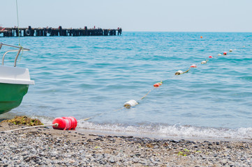 Beach buoys on the sea beach and blue sky