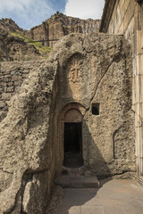A cross carved in a rock, the Geghard monastery