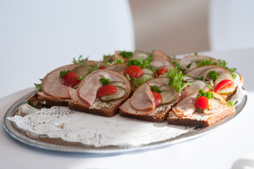 Sandwiches with beef, snacks for party.