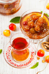Cherry Jam with Nuts. Azerbaijani Cuisine White Cherry Preserves. Selective focus.