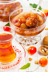 Cherry Jam with Nuts. Azerbaijani Cuisine White Cherry Preserves. Selective focus.