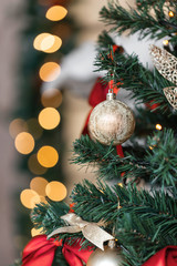 Christmas ball and garland on the fir tree
