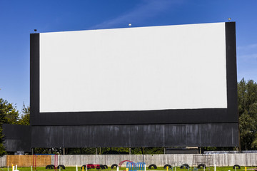 Old Time Drive-In Movie Theater with blank white screen for copy space or advertising I