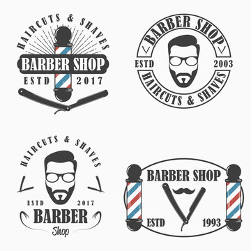 Barber Shop logo set. Templates of Hairdressing salon emblems. Vector illustration.