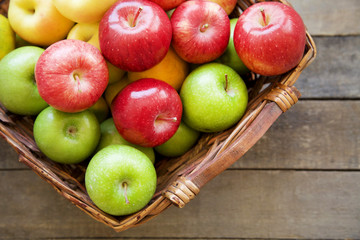 Fresh red apples in the wooden box