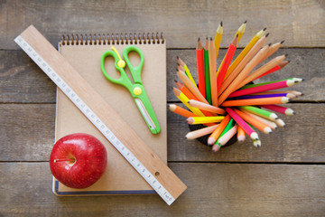 School supplies on wooden background