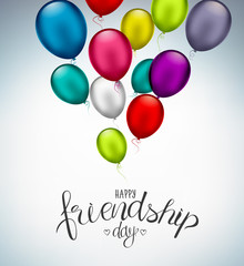 Happy Friendship day, holiday of the best friends. Hand drawn congratulatory inscription with colorful air balloons. Creative lettering design for greeting card, poster or art design.