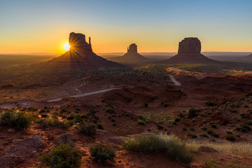 Sunrise at Monument Valley, Panorama of the Mitten Buttes - seen from the visitor center at the Navajo Tribal Park - Arizona and Utah, USA