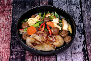 Fried big noodle topped mixed vegetables for organic food.