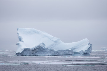 Iceberg amonst sea ice, Antarctica