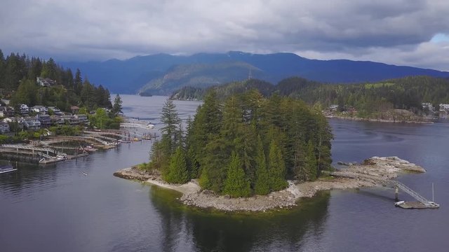 Aerial 4k drone view of a park in Deep Cove during a vibrant springtime day. Taken in North Vancouver, British Columbia, Canada.

