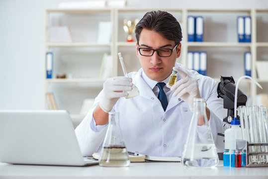 Young researcher scientist doing a water test contamination expe