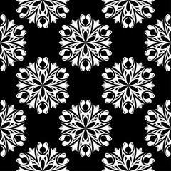 White floral seamless pattern on black background