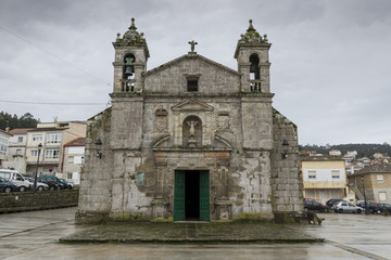 Fototapeta na wymiar Church of the Santa Liberata, a chapel in Italian plateresque style, started in 1695, in Baiona, Galicia, Spain, on December 28, 2015