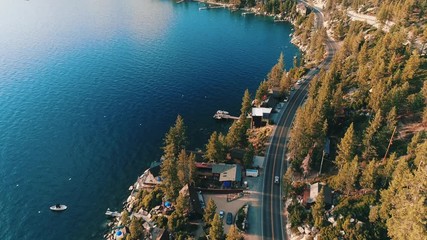 Aerial shot of lake with beautiful lakefront and shore