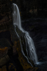 Fototapeta na wymiar Long exposure capture of Grannifoss waterfall in the valley of Bjorsardalur, Iceland