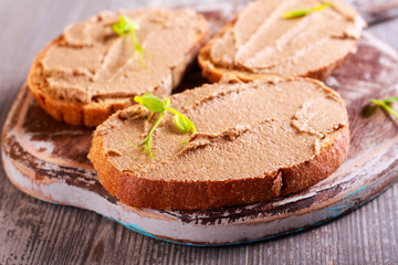 Duck liver spread over brown bread