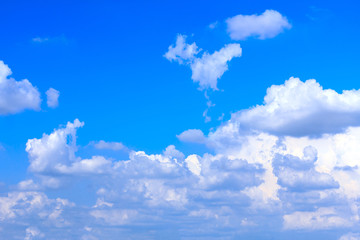 Blue sky with white clouds. rain clouds on sunny summer or spring day.