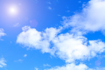 Blue sky with white clouds. rain clouds and sunshine on sunny summer or spring day.