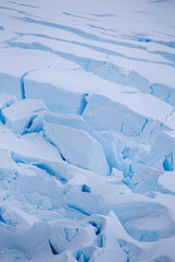 Fototapeta na wymiar Huge crevasses on this glacier in Antarctica
