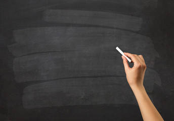 Hand holding chalk
