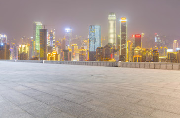 Road pavement and city skyline