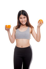 Beautiful Asian healthy girl with orange juice and orange fruit.