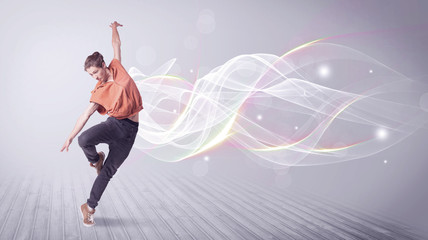 Urban breakdancer dancing with white lines