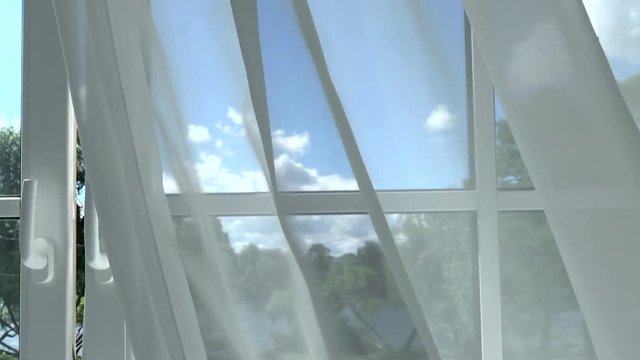 The window through the curtains at the sky. The curtain blown by a gentle wind. Window to the world of light and happiness.