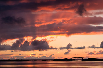 The Atlantic road in silhouette against the sunset in Norway