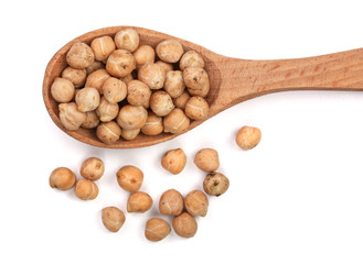 Dry raw organic chickpeas in a wooden spoon isolated on white background. Top view