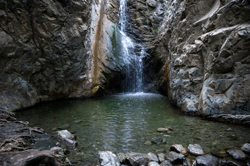 Millomeris waterfall and a water pool view near Platres, central region of Cyprus