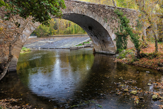 Stone Bridge over the Eresma river. Segovia. Spain.