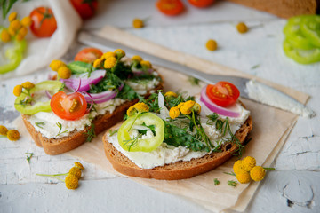 Four sandwiches on the board