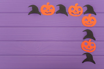 Pumpkins and hats different paper silhouettes made of halloween corner frame