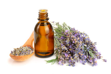 Bottle with aroma oil and lavender flowers isolated on white background