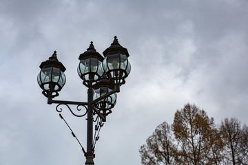 Fototapeta na wymiar Vintage old lantern on a city street 