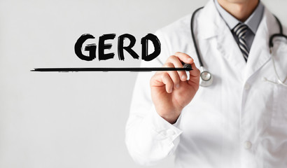 Doctor writing word GERD with marker, Medical concept
