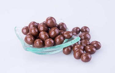 chocolate balls. chocolate balls in bowl on a background