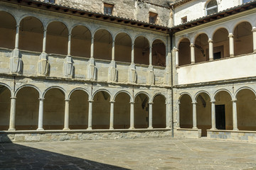 Naklejka premium details of the courtyard of the cloister of an ancient monastery in the Olot town in Gerona, Spain.