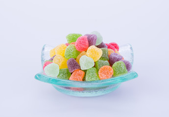candies. jelly candies in glass bowl on a background