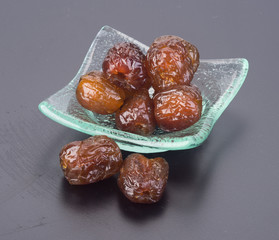 preserved fruits. chinese sugar date preserved fruits on the background